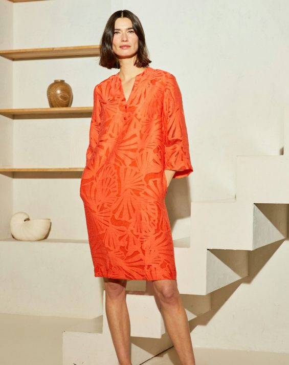 Oranje jurk in brokante print